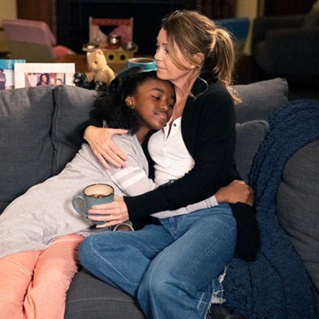 Aniela Gumbs and Emily Pompeon hugging each other.